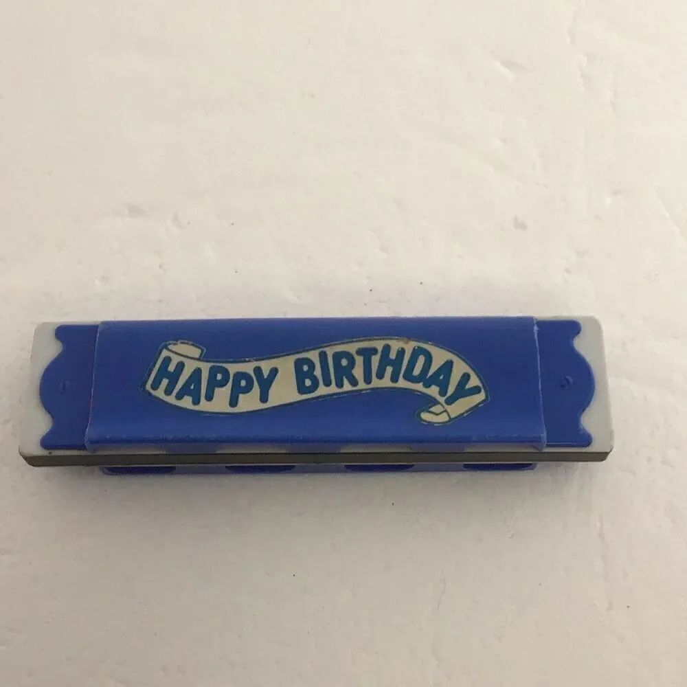 Vintage plastic, happy birthday harmonica